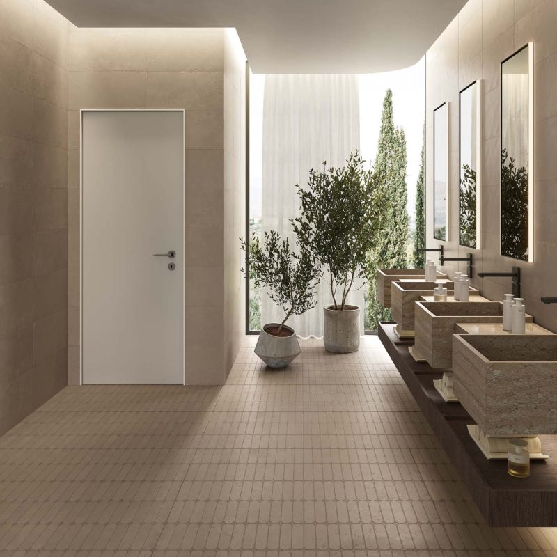 Carrelage sol motifs geometriques béton ciré marron Ueno Moka ambiance wc